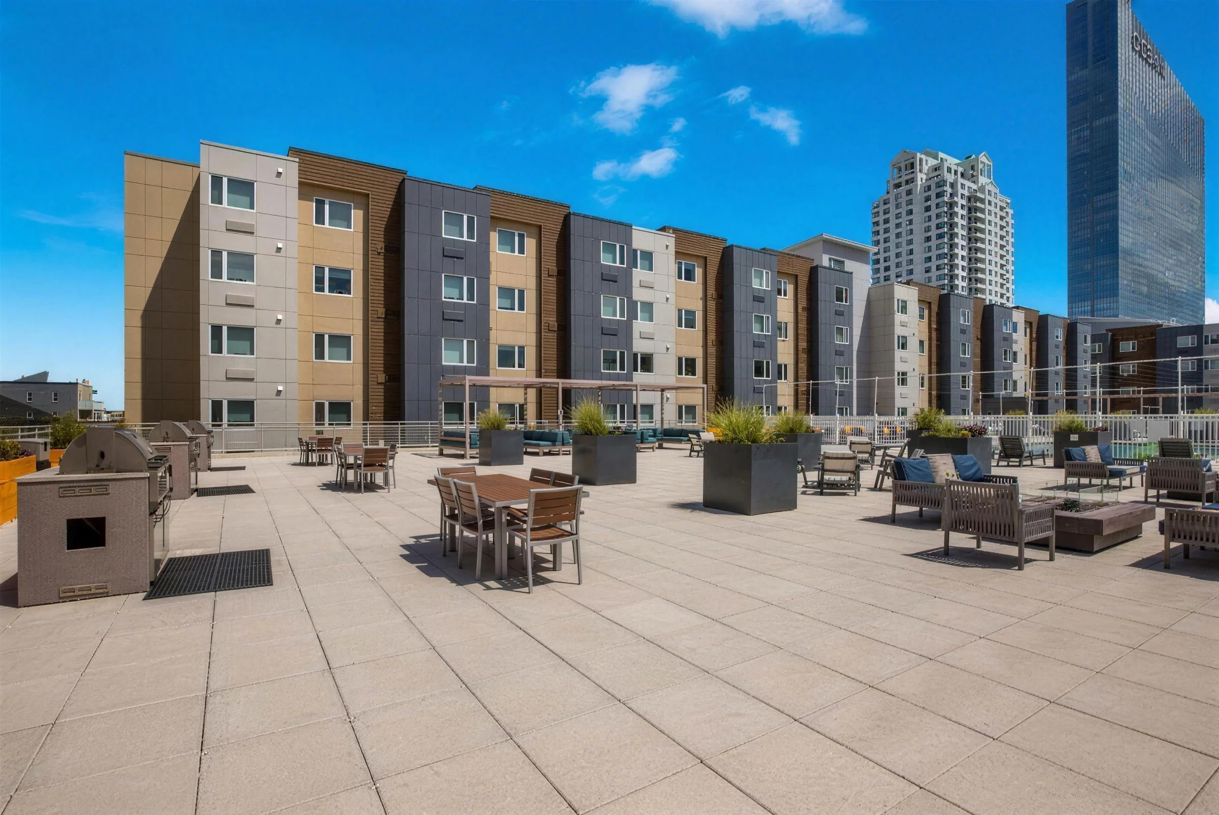 Grills and dining tables on the pool deck